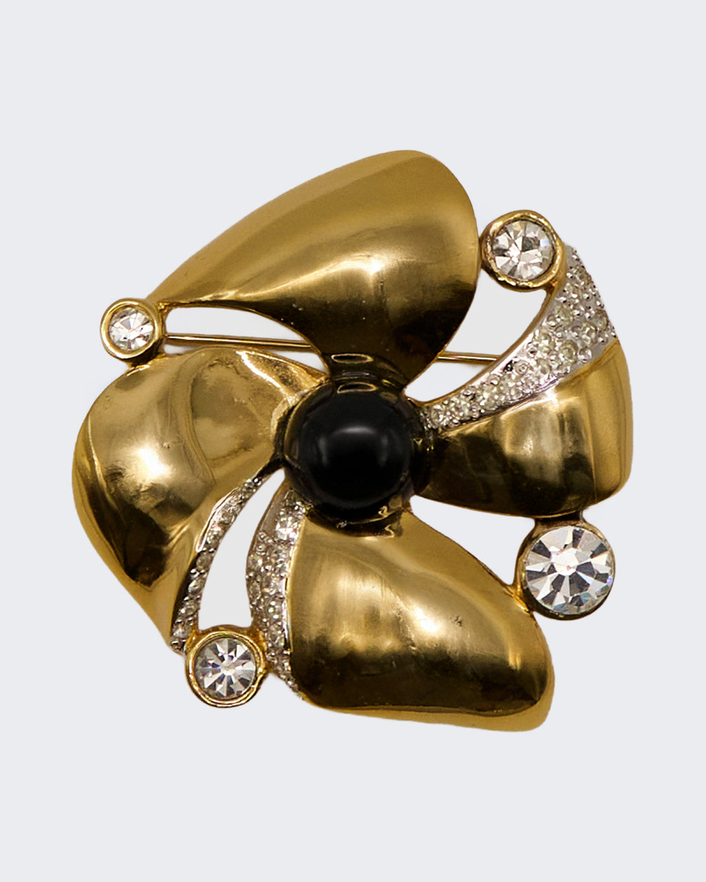 Spilla Vintage Dorata con Smalto Nero e Strass – Fiore Stilizzato Elegante