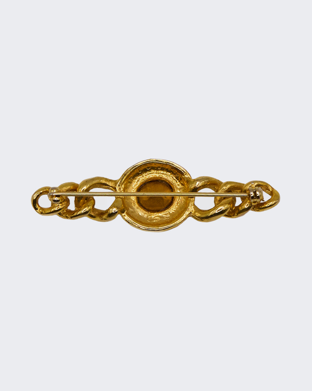 Spilla Vintage con Catena Placcata Oro e Cristallo Centrale – Design Groumette