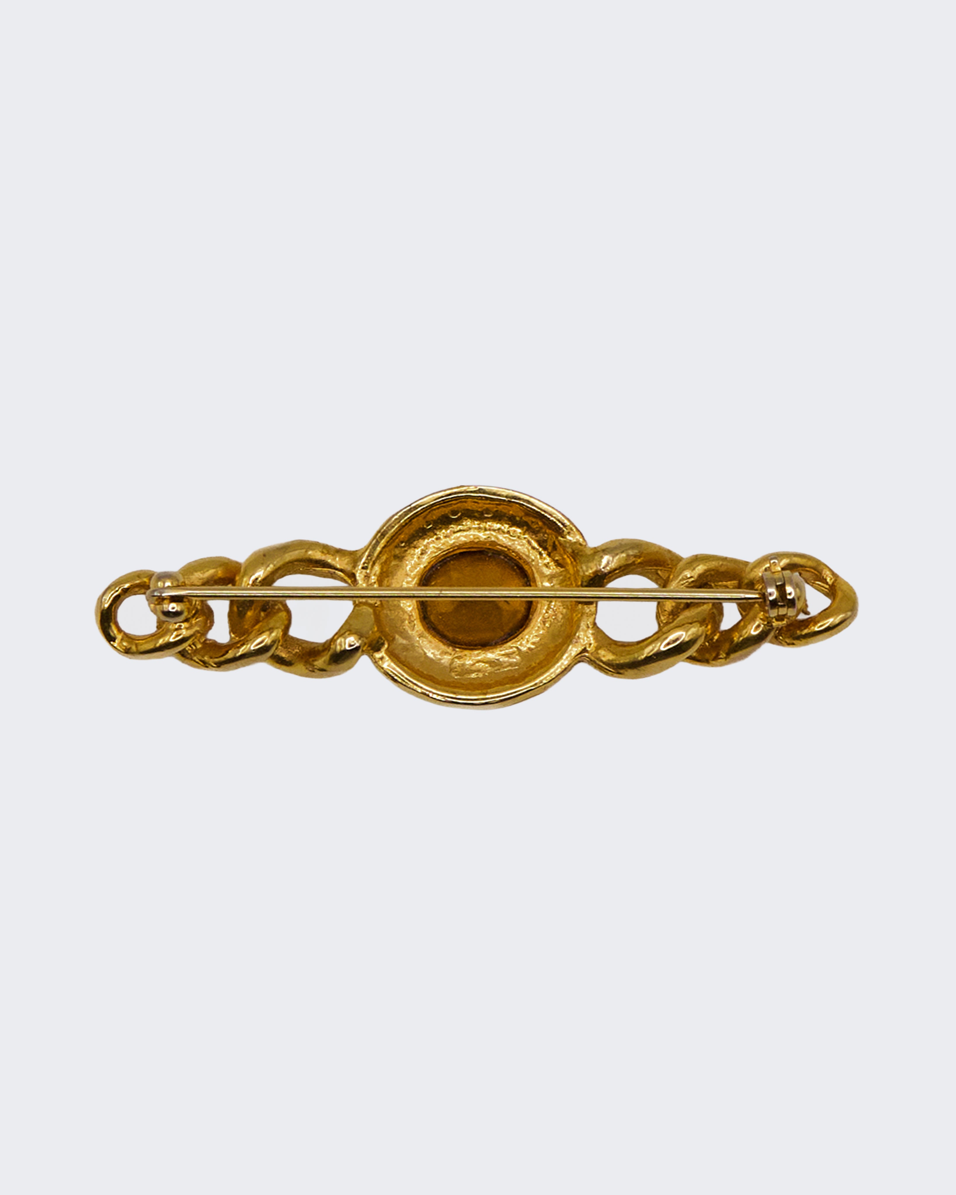 Spilla Vintage con Catena Placcata Oro e Cristallo Centrale – Design Groumette