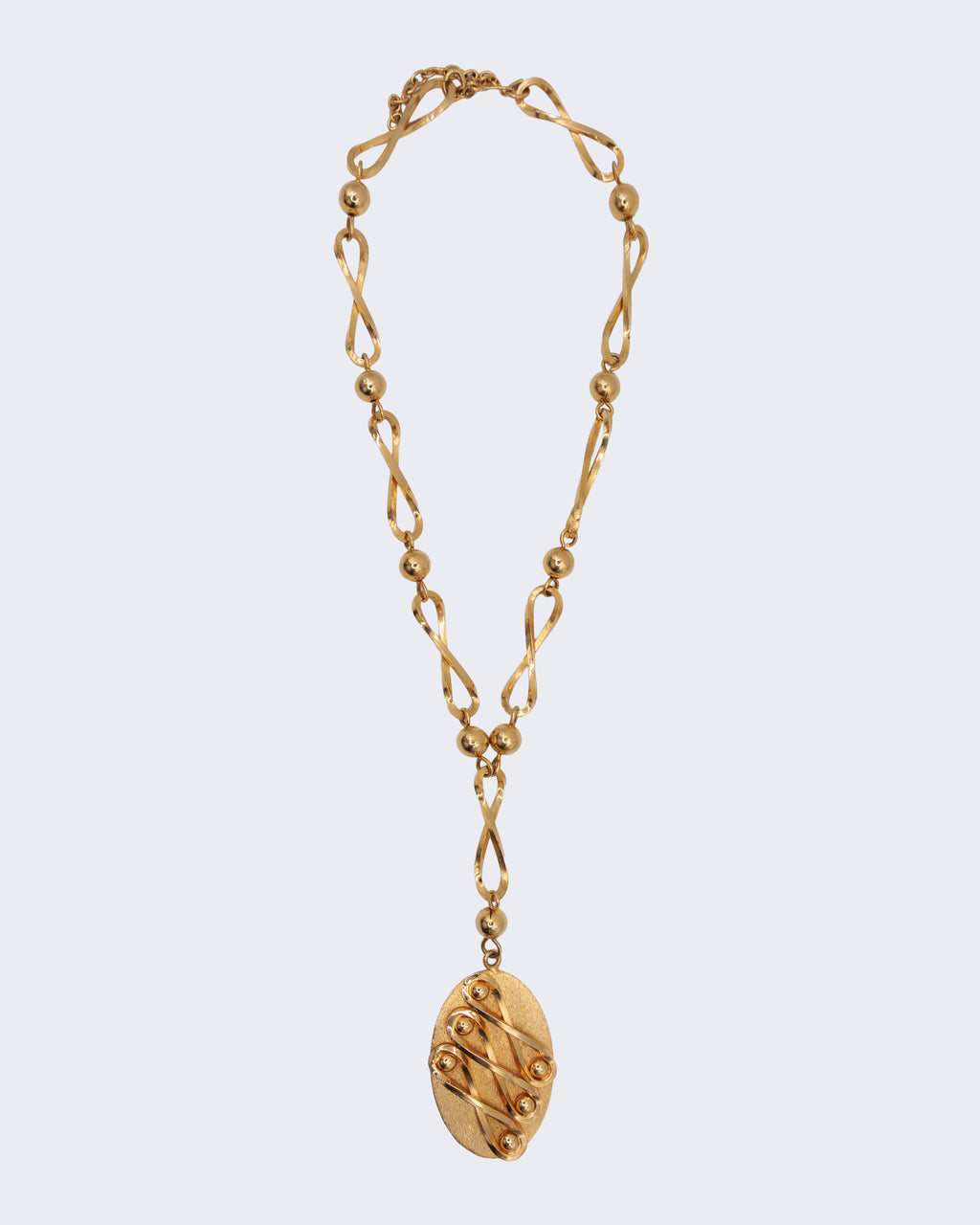 Collana Vintage Dorata con Pendente Ovale – Design Geometrico Retrò