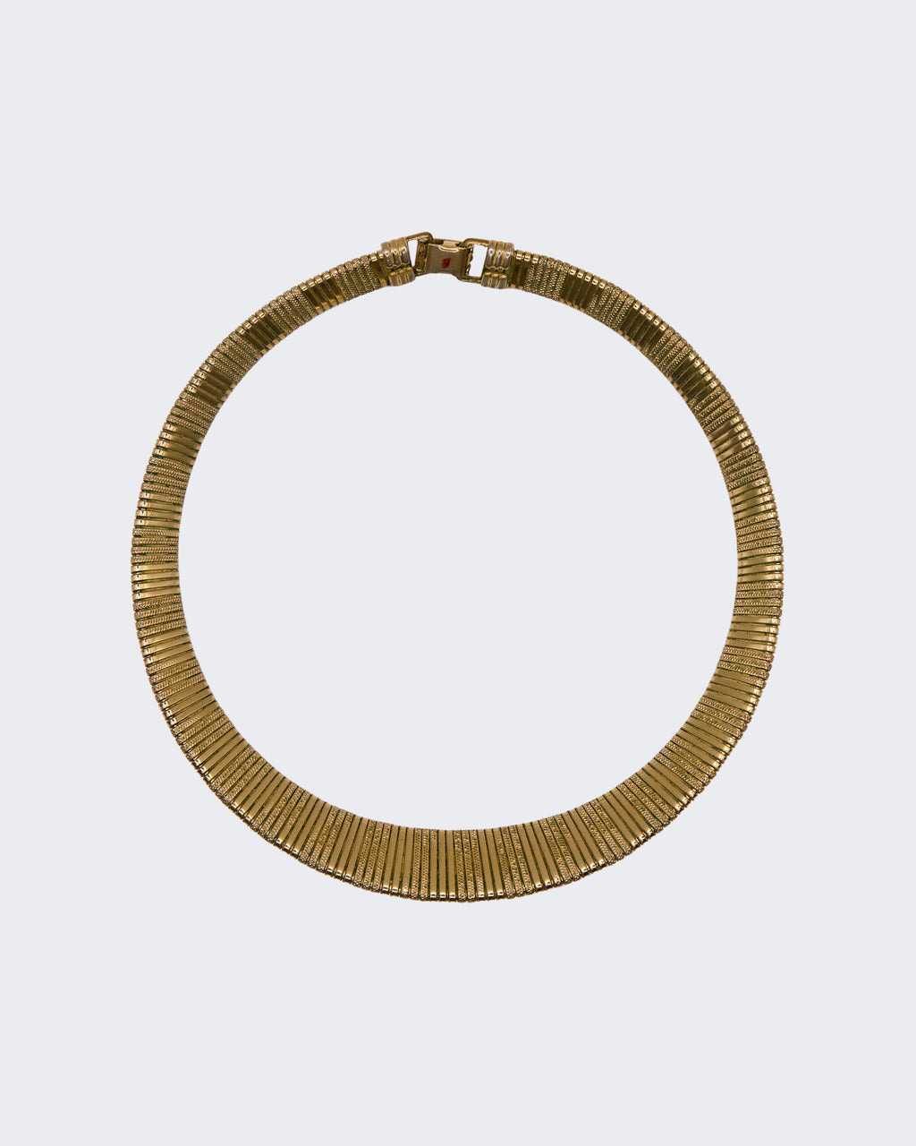 Collier Tubogas Vintage G en métal plaqué or – Bijou iconique des années 1970 