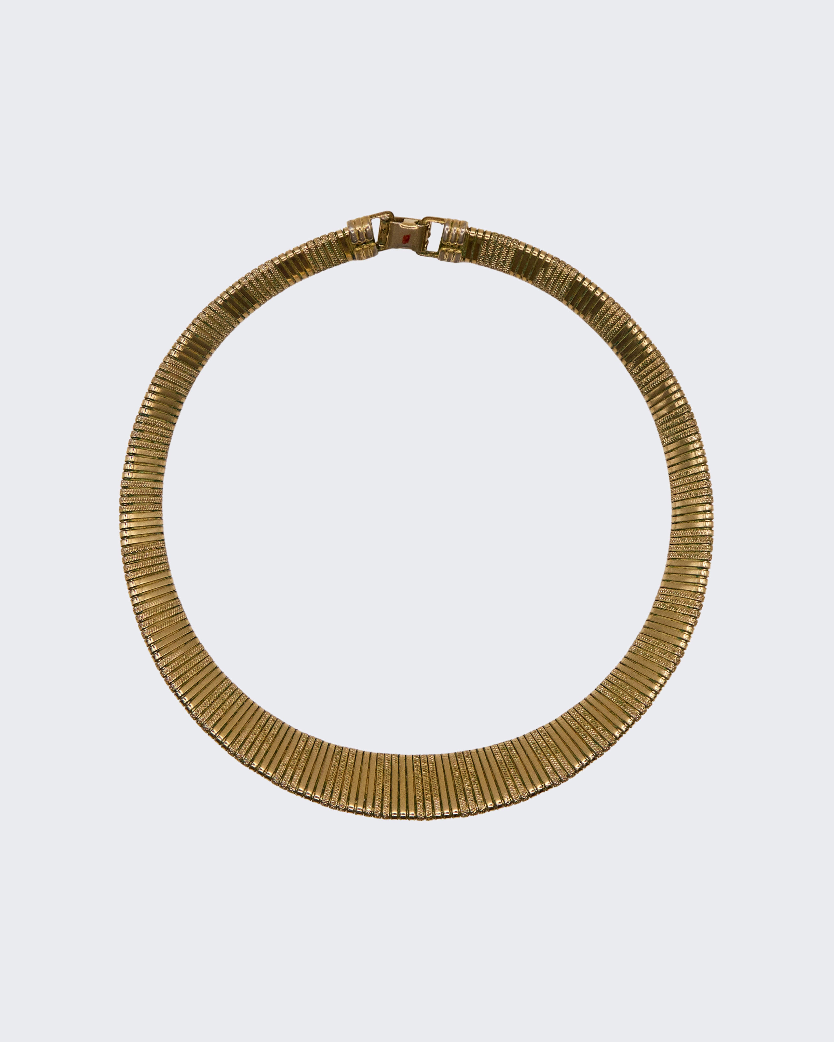 Collier Tubogas Vintage G en métal plaqué or – Bijou iconique des années 1970 