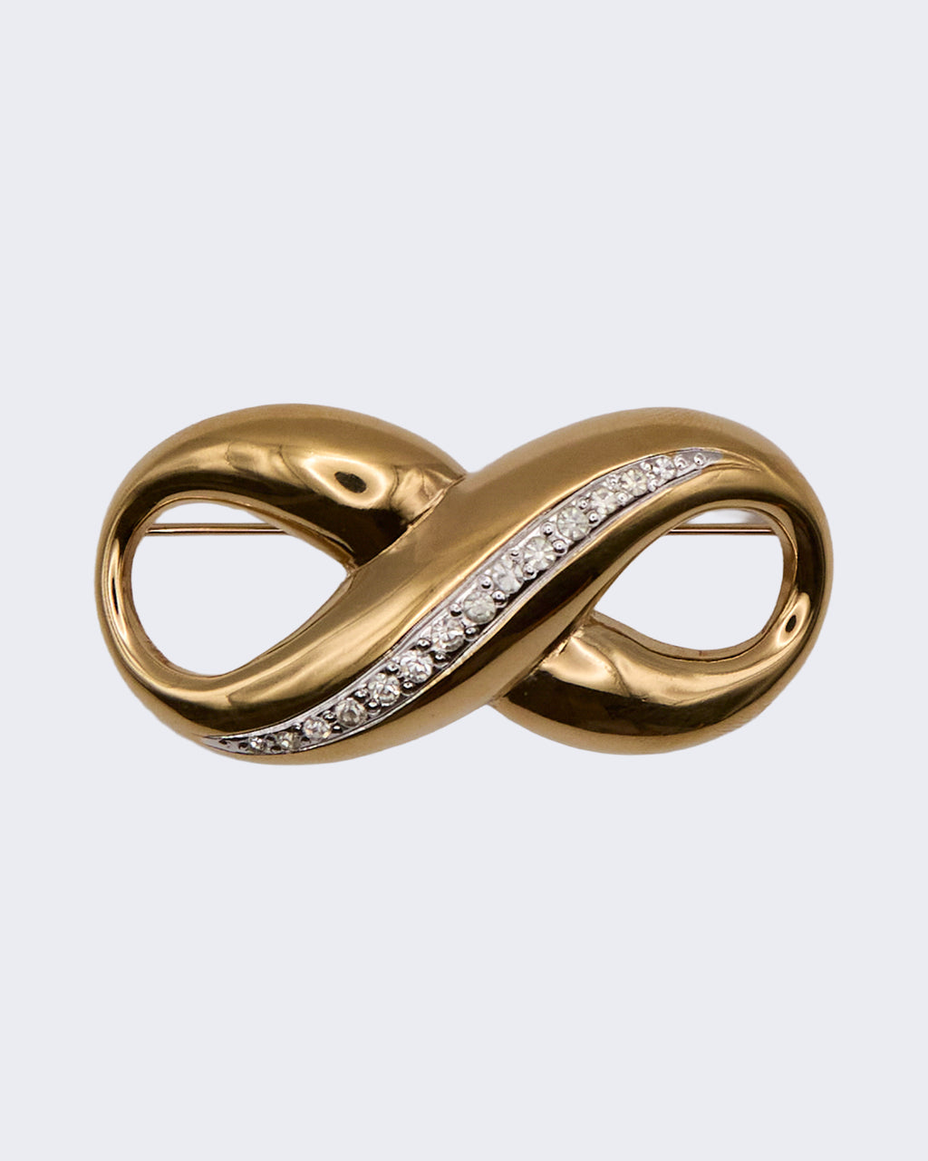 Spilla Vintage Infinito in Metallo Dorato con Cristalli – Design Elegante