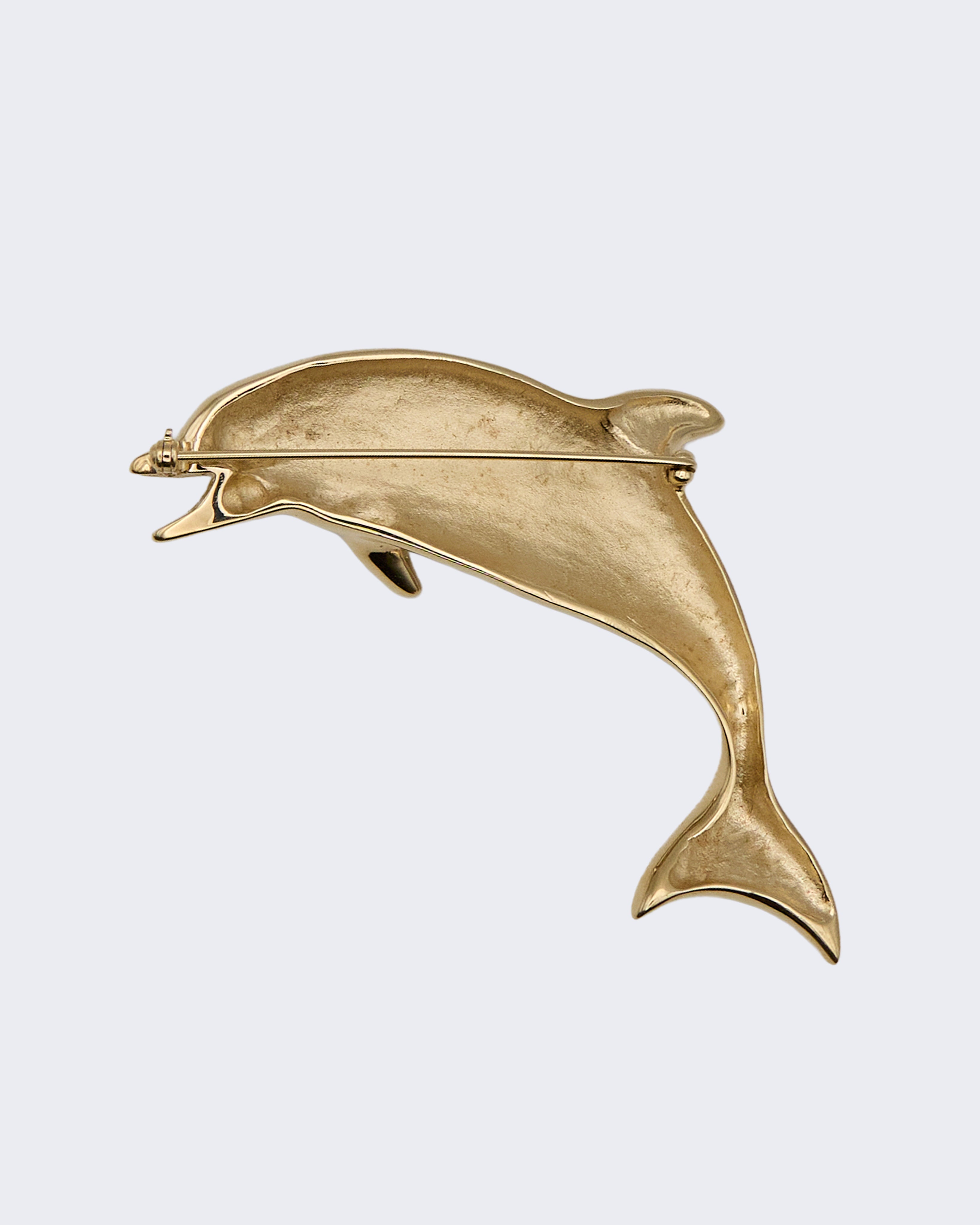 Vintage Gold-Tone Metal Dolphin Brooch – Dynamic Design, Elegant Costume Jewelry