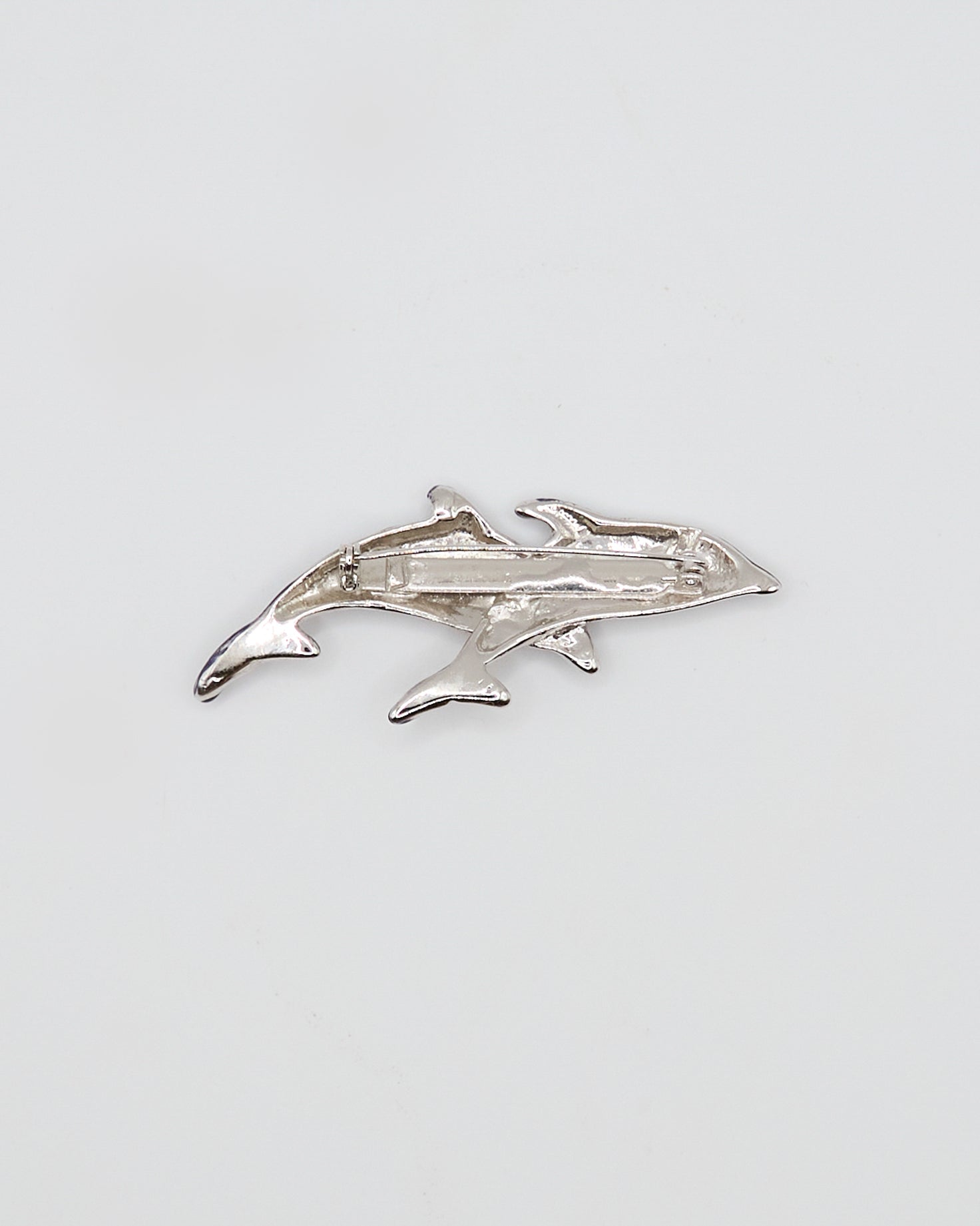 Dolphin brooch