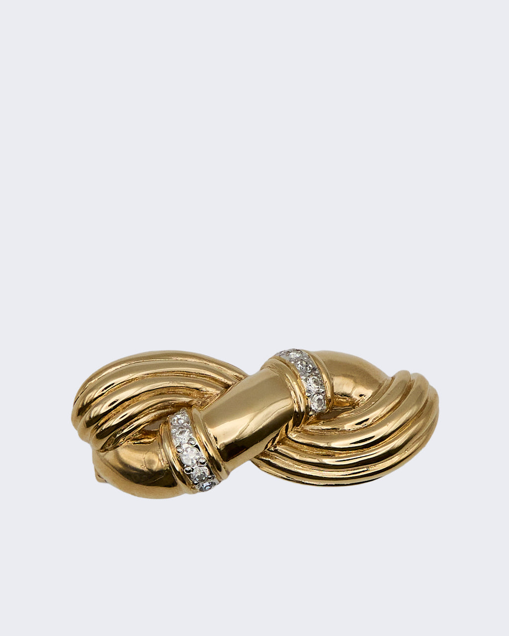 Spilla Vintage a Nodo d’Amore in Metallo Dorato con Strass