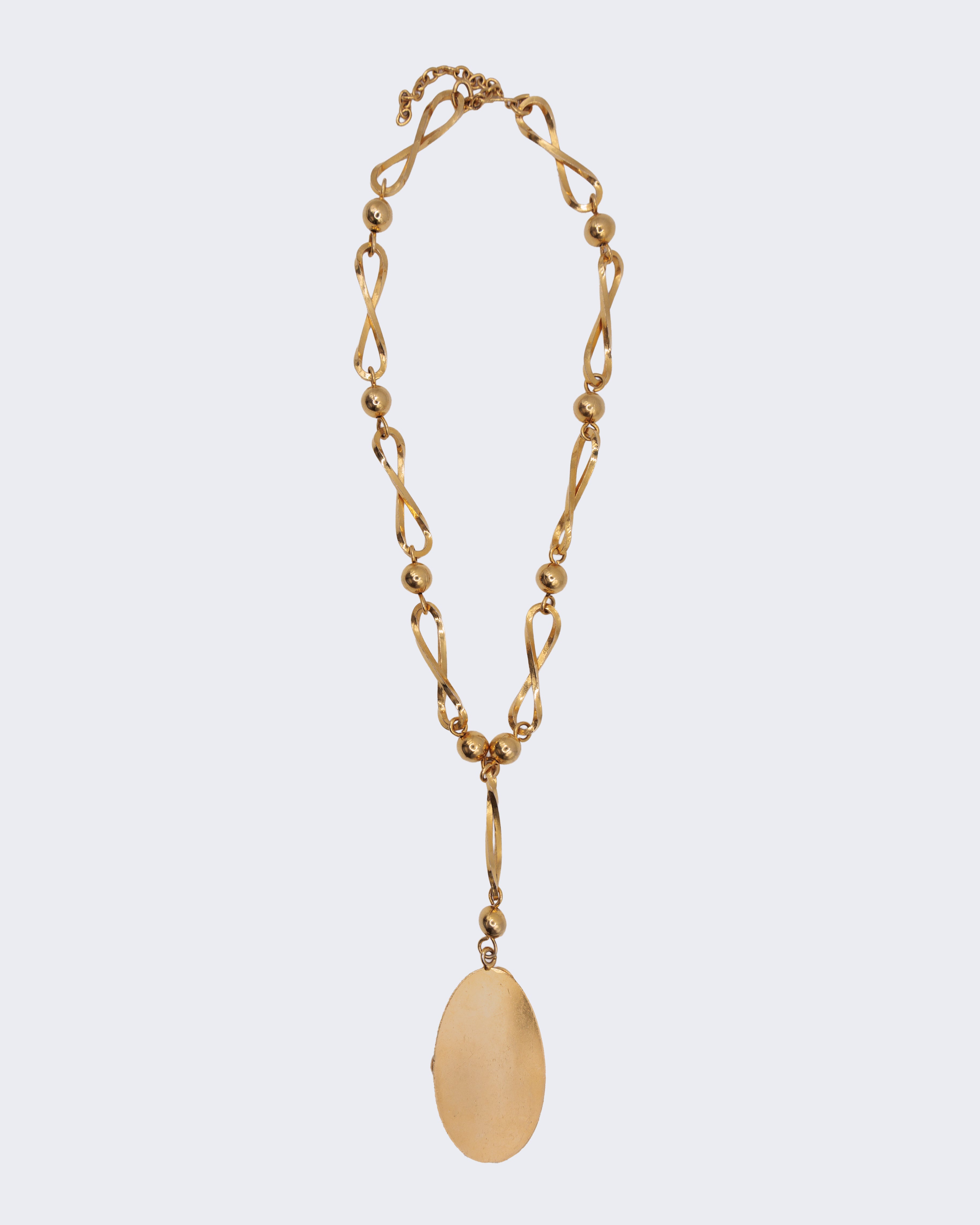 Collana Vintage Dorata con Pendente Ovale – Design Geometrico Retrò