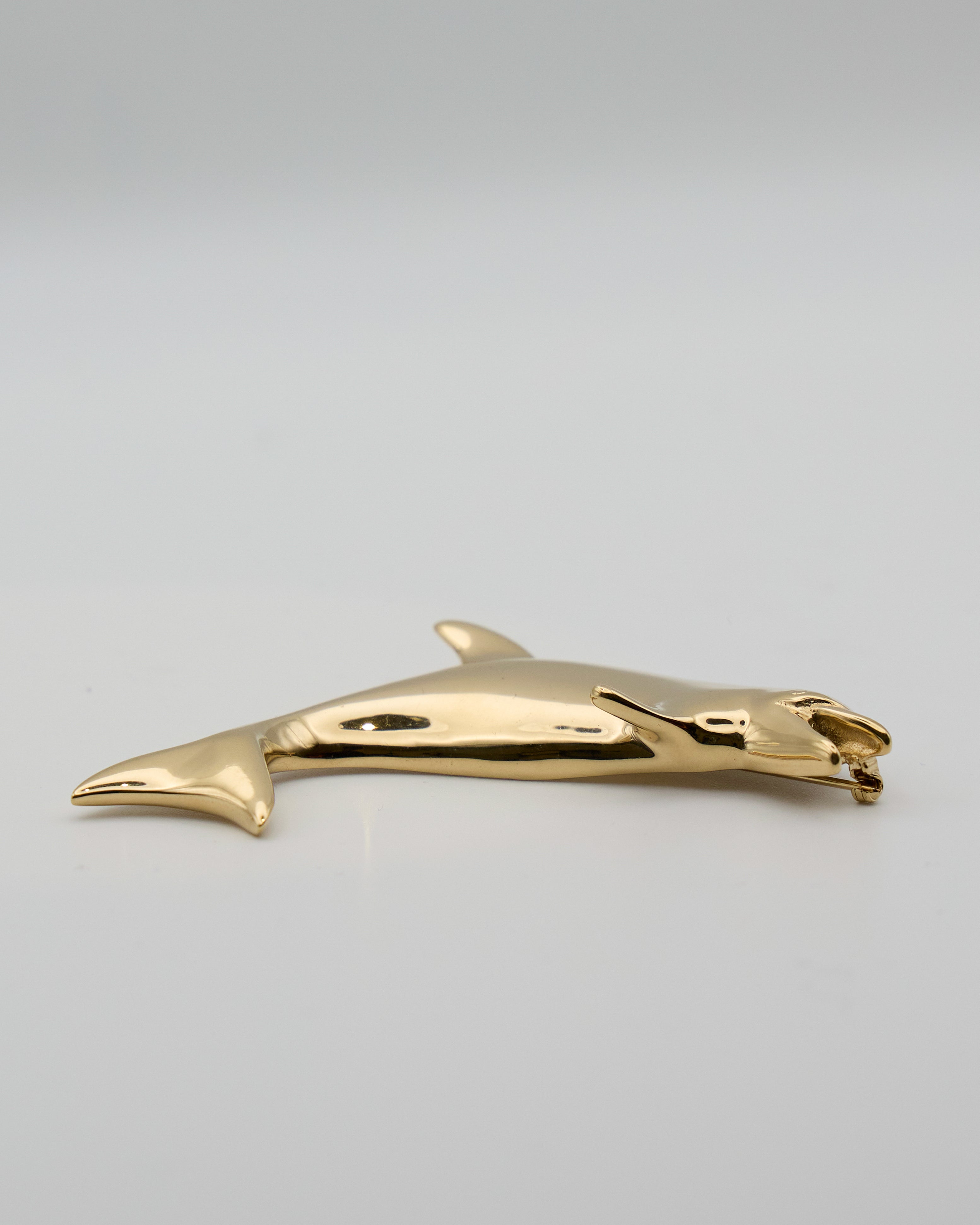 Vintage Gold-Tone Metal Dolphin Brooch – Dynamic Design, Elegant Costume Jewelry