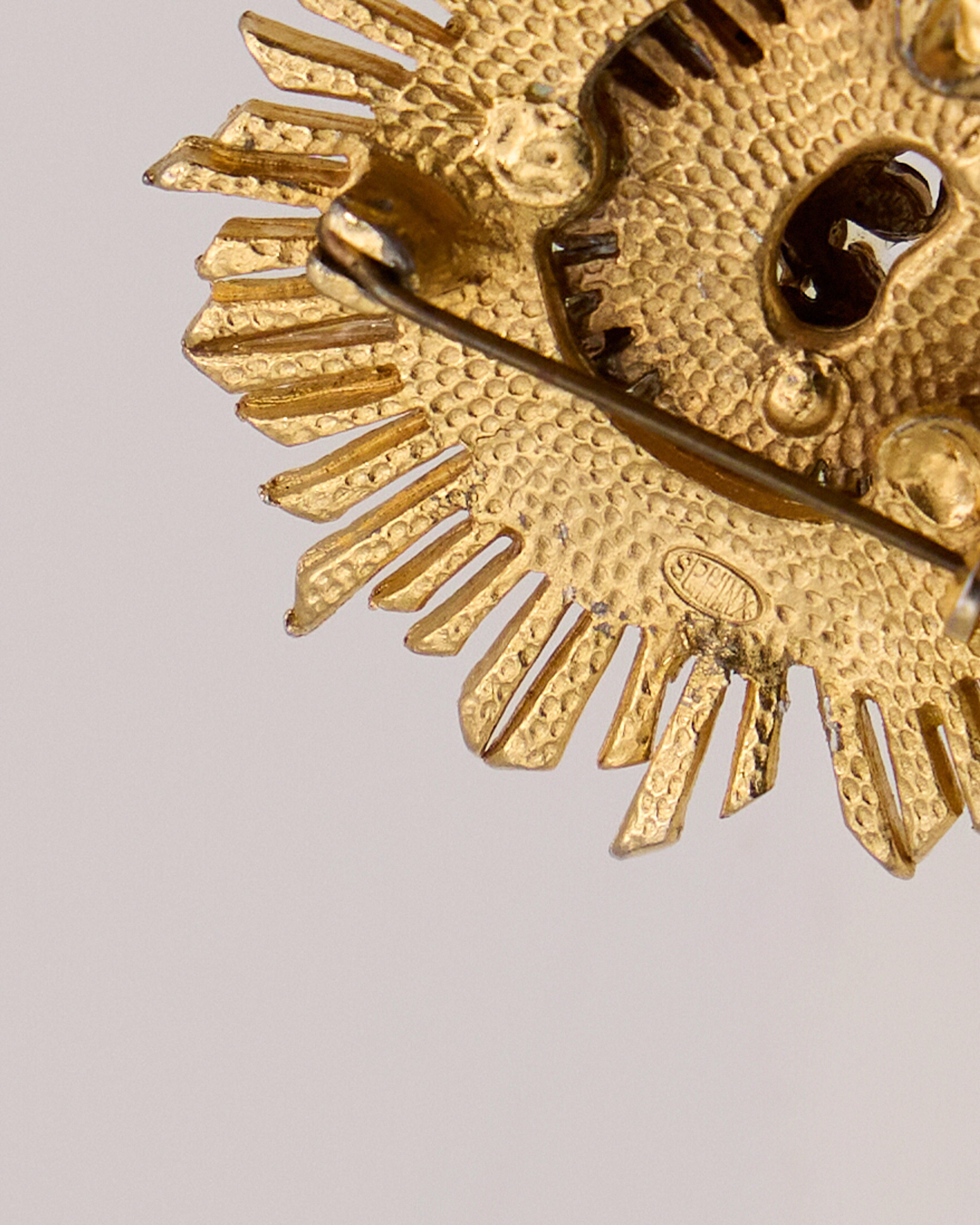 Vintage Sphinx Flower Brooch – Gold Metal with Clear and Green Rhinestones