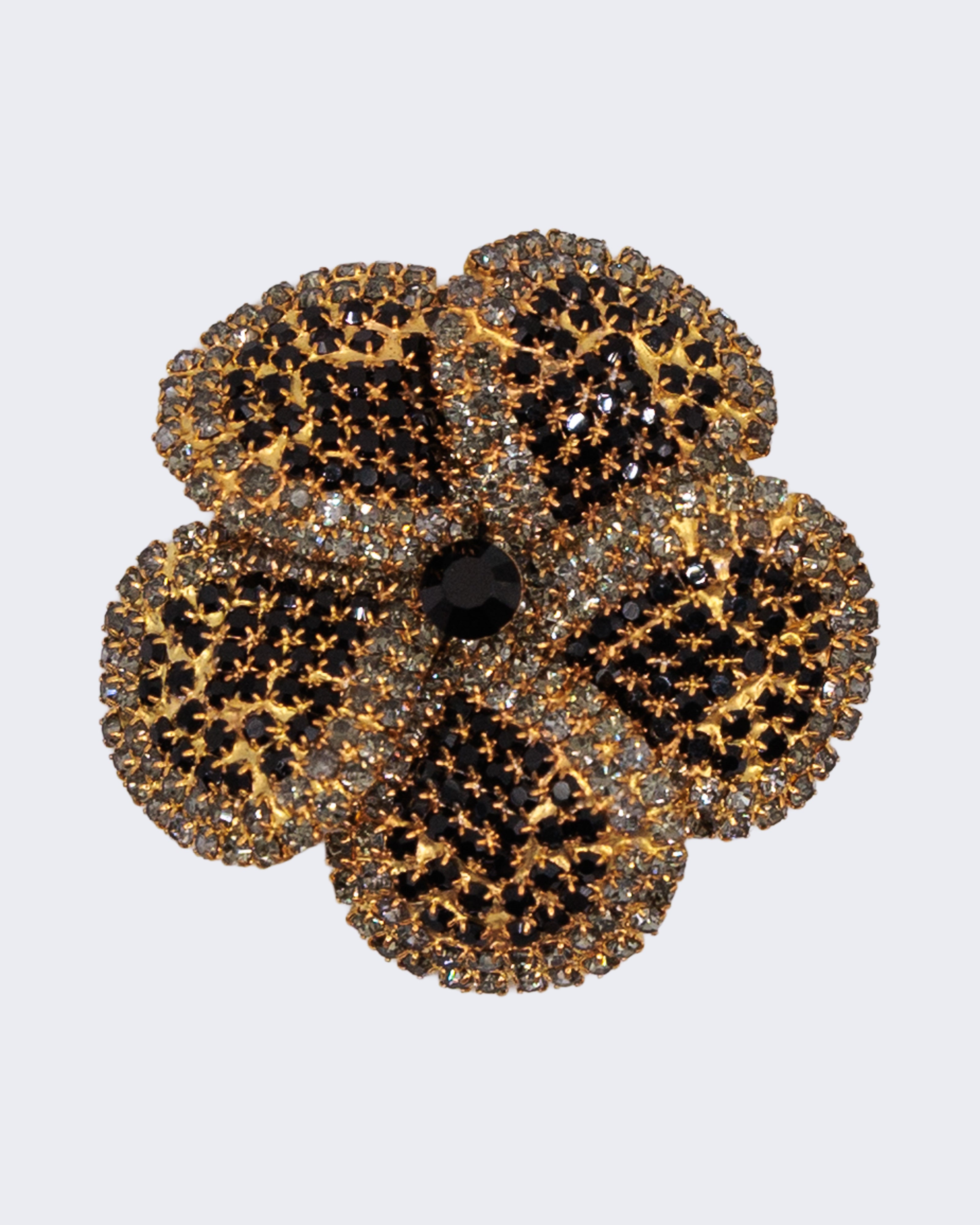 Spilla vintage a fiore con strass neri e cristalli trasparenti, design elegante anni ’50