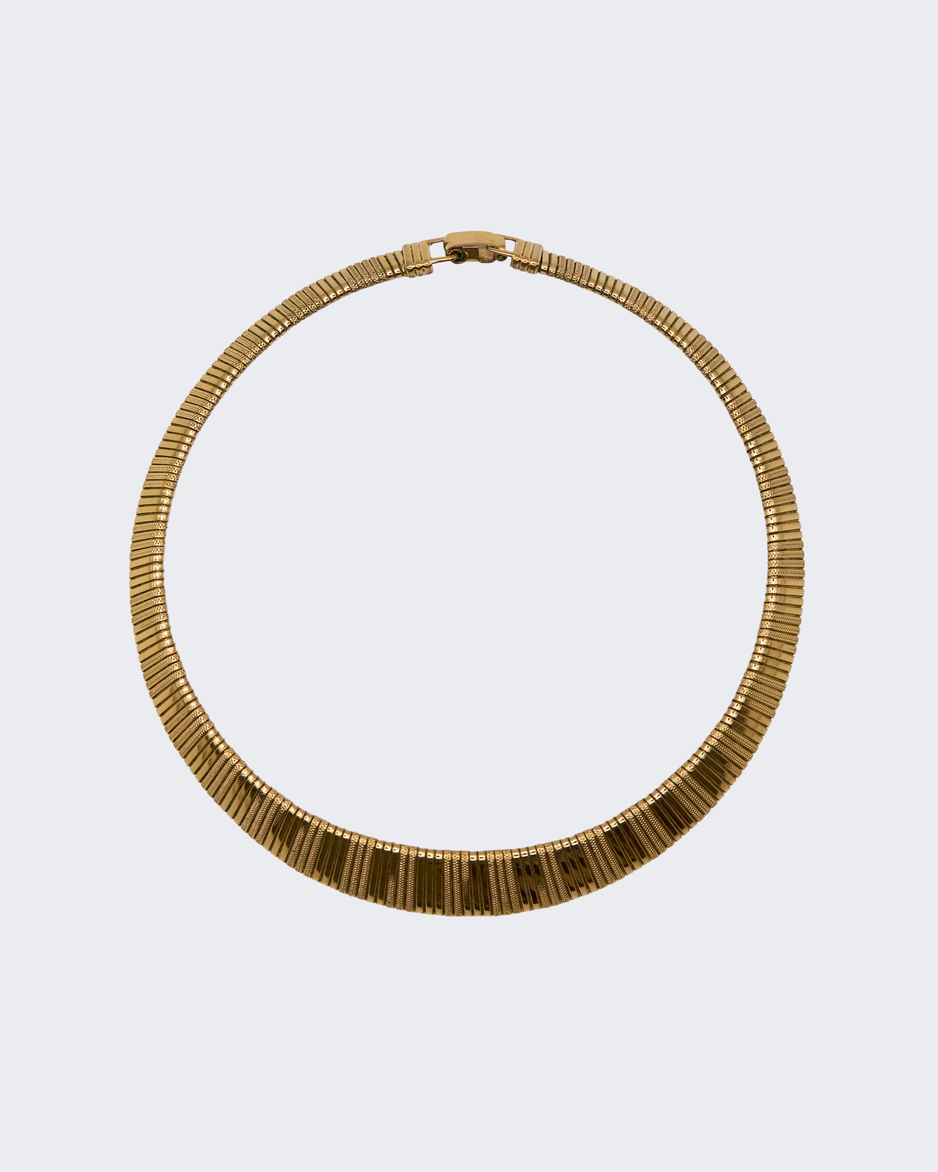 Collier Tubogas Vintage G en métal plaqué or – Bijou iconique des années 1970 