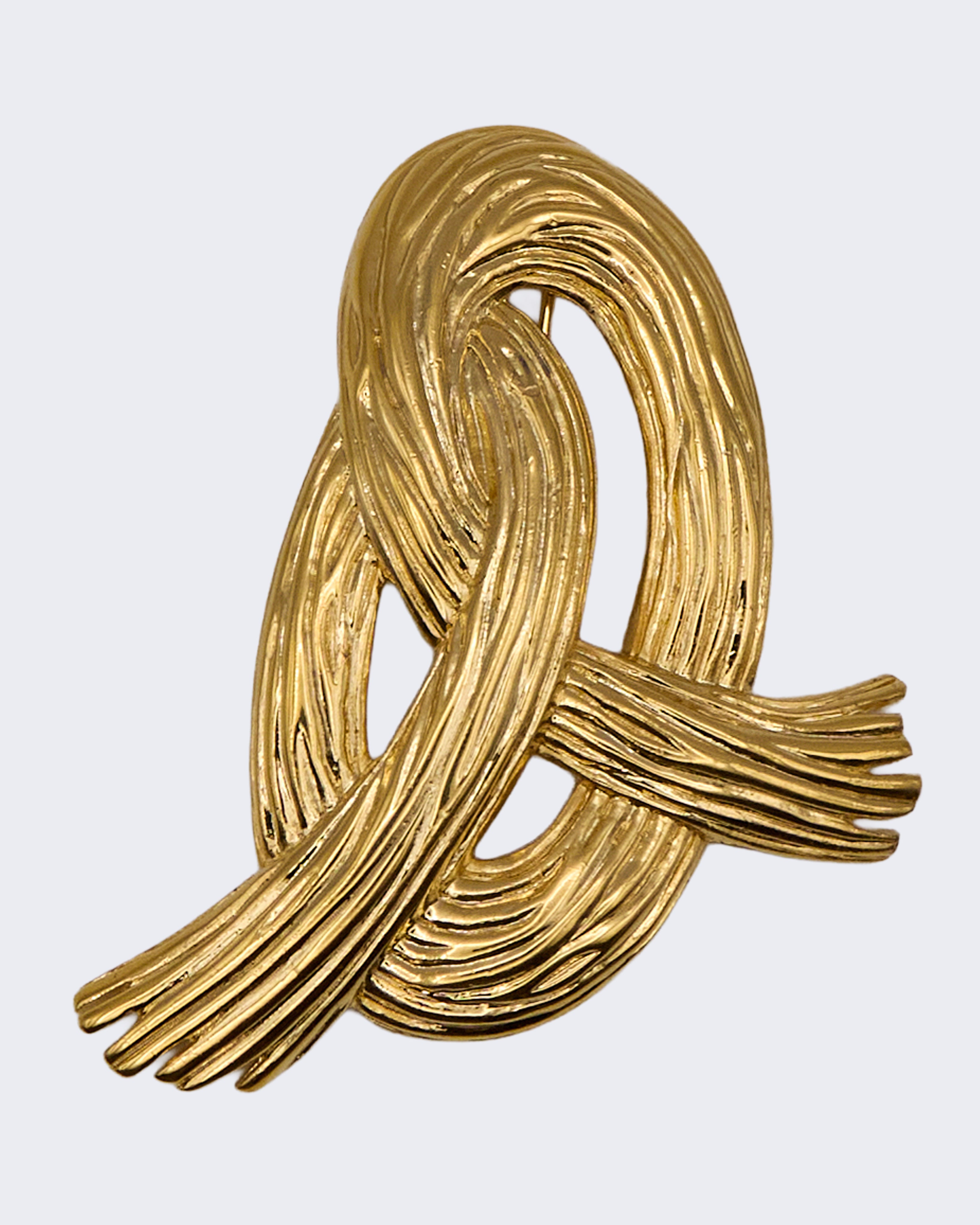 Spilla Vintage Dorata Design Nodo Intrecciato – Gioiello Elegante