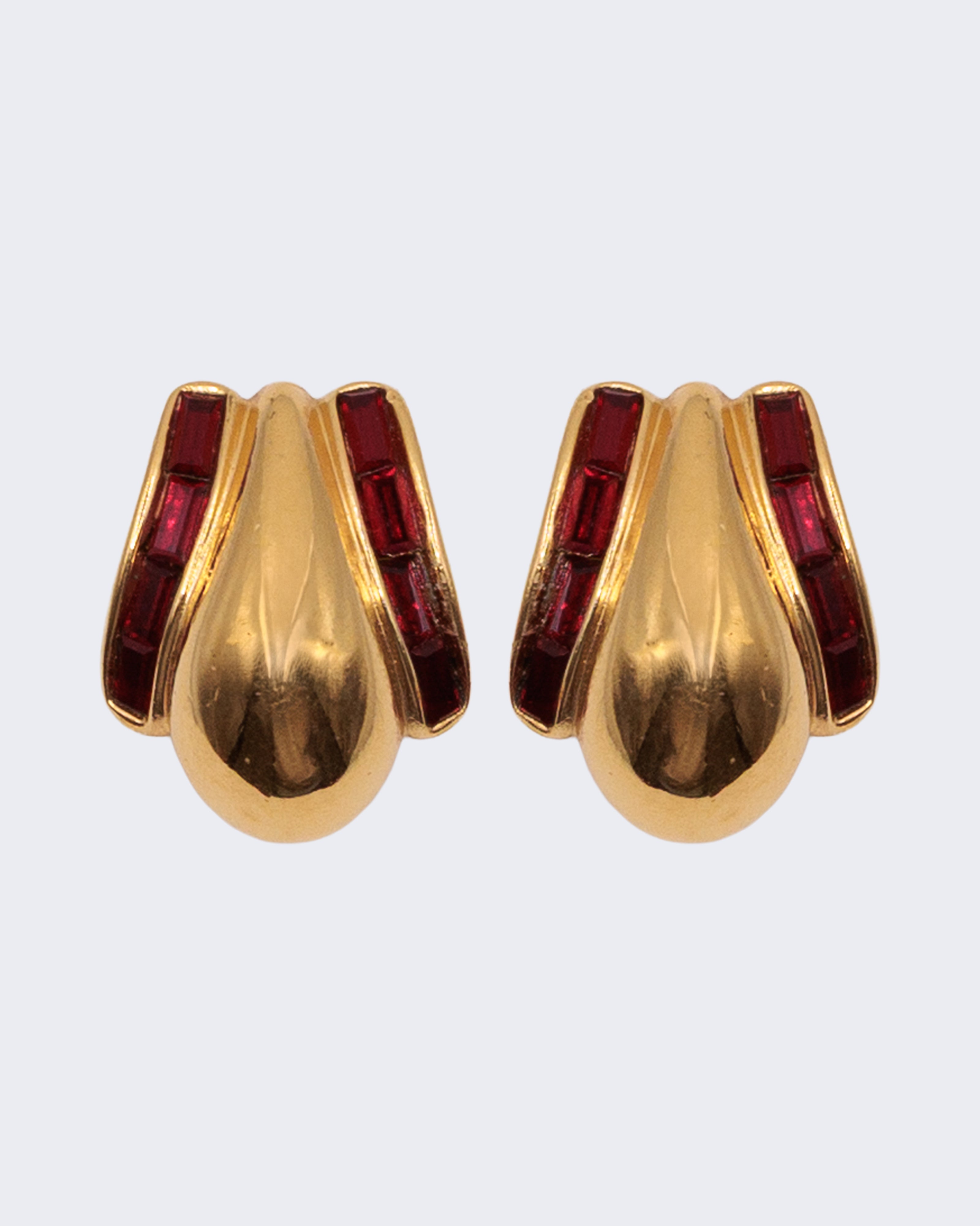 Orecchini firmati Yves Saint Laurent  dorati con strass rossi
