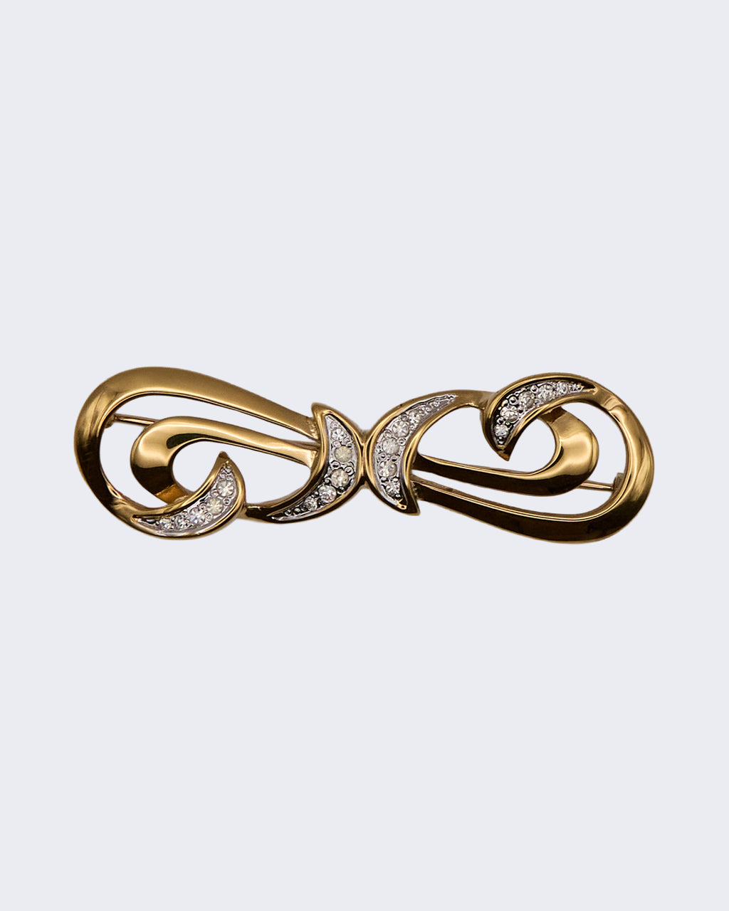 Spilla Vintage Dorata con Volute e Cristalli – Gioiello Elegante