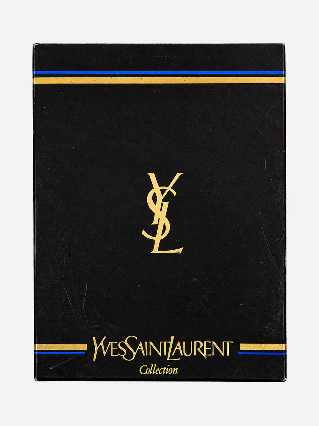 Scatola nera Yves Saint Laurent Collection con monogramma dorato e fasce decorative blu e oro.