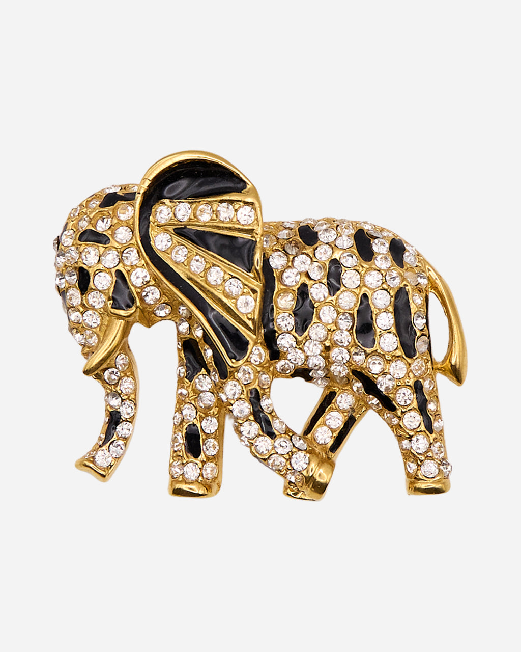 Spilla vintage a elefante in metallo dorato con smalto nero, cristalli trasparenti e grande orecchio in rilievo.