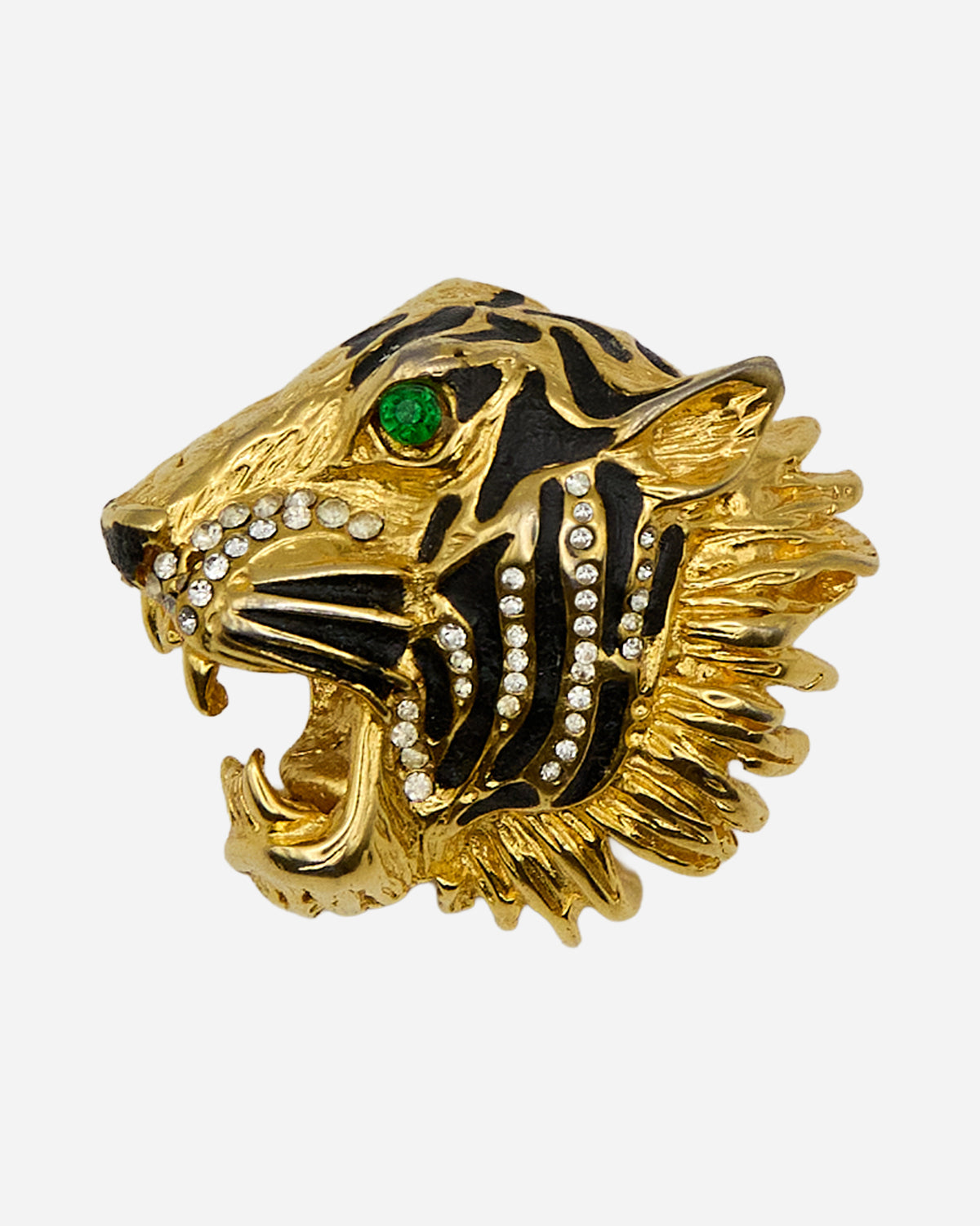 Spilla vintage a testa di tigre dorata con striature nere, cristalli trasparenti, occhio verde e bocca aperta.